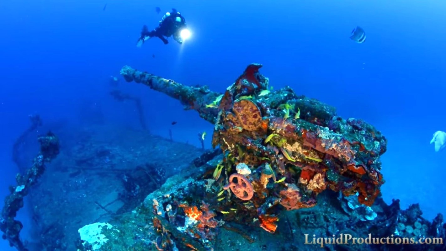 A diver exploring a shipwreck.