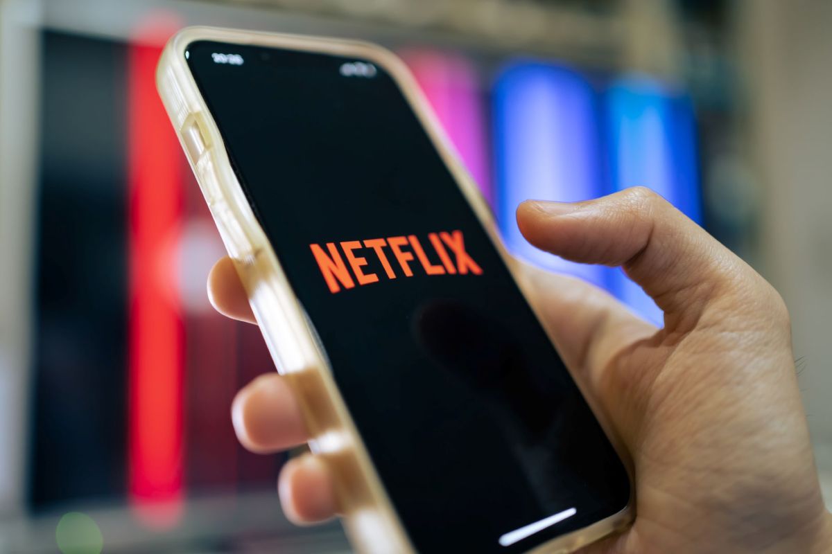 The Netflix logo on a smartphone.