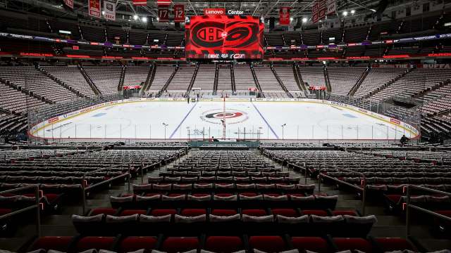 The interior of the Lenovo Center, with its red seats in the foreground.