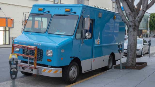 A blue PG&E utility truck.