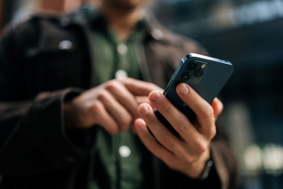 A person holding a smartphone.
