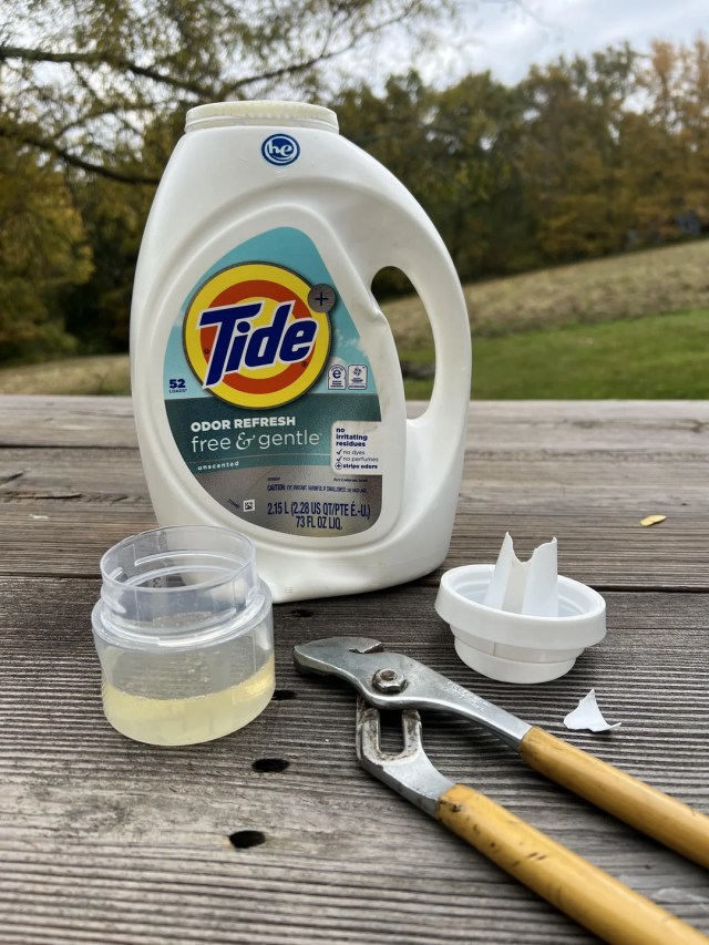A Tide bottle and pliers.