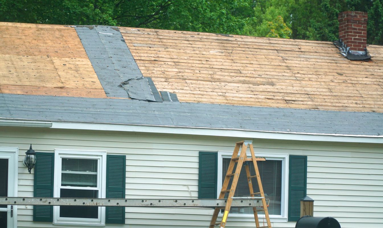 A house with a roof replacement underway.