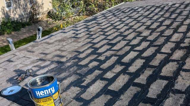 Patching a roof.