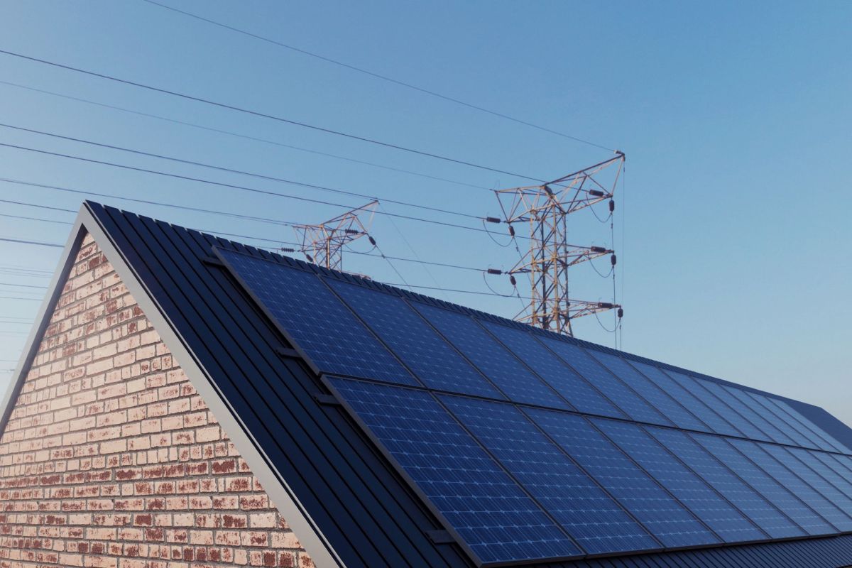 A house with rooftop solar panels.