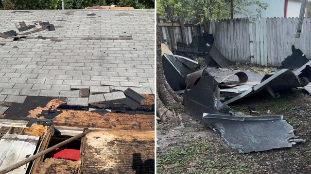 A damaged roof with missing shingles beside debris in a yard.