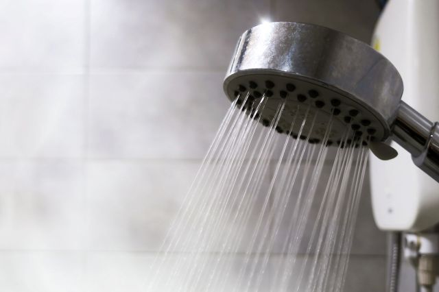Water running from a showerhead.