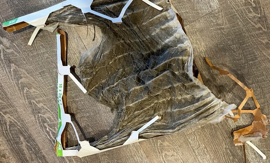 A shredded furnace air filter.