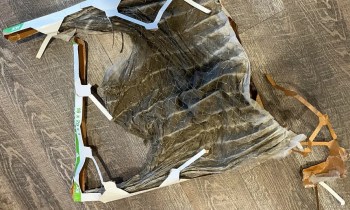 A shredded furnace air filter.
