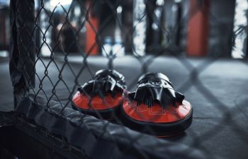 Sparring gloves in a gym.