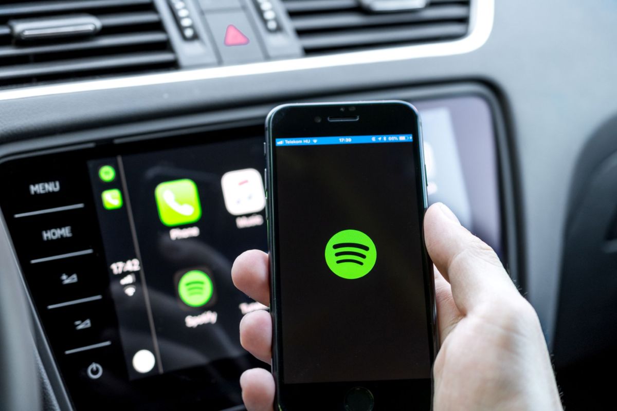 A person looking at Spotify.