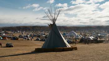 A teepee surrounded by various tents, protesting the Dakota Access Pipeline near the Standing Rock Sioux Reservation.