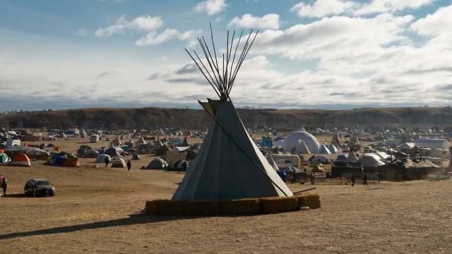A teepee surrounded by various tents, protesting the Dakota Access Pipeline near the Standing Rock Sioux Reservation.