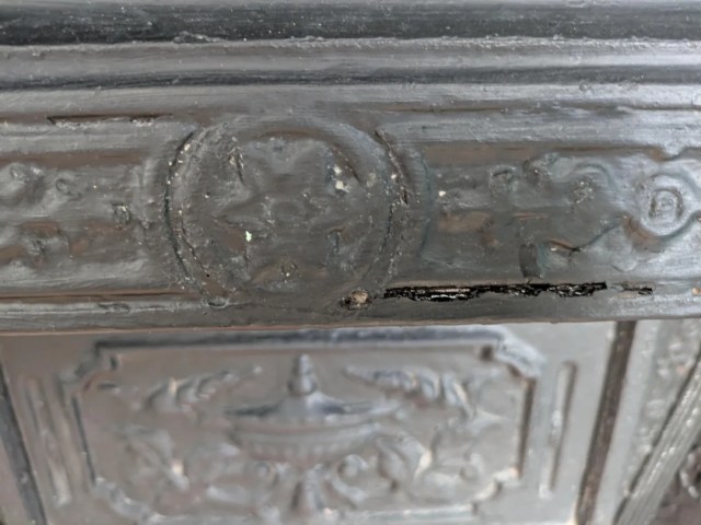 A painted fireplace.