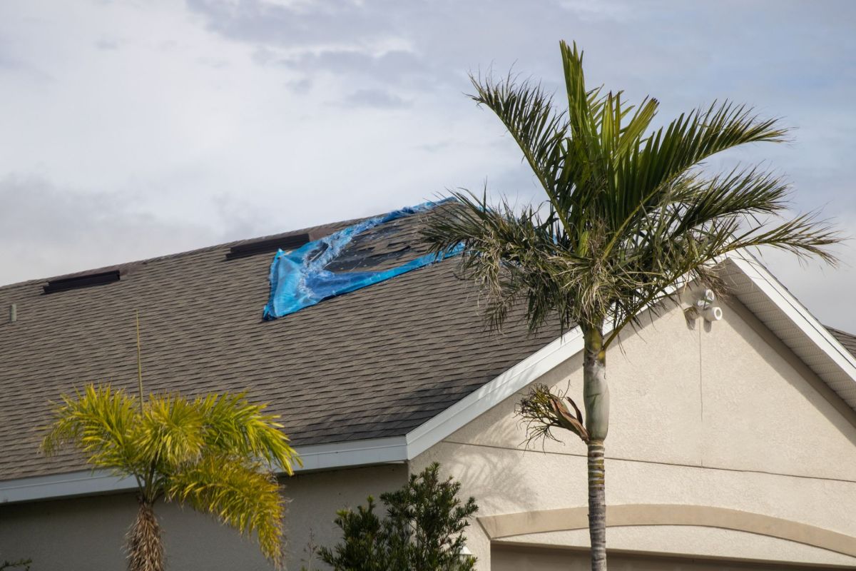 A tarp on a roof.