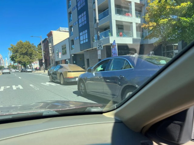 A different view of the car missing a door panel.