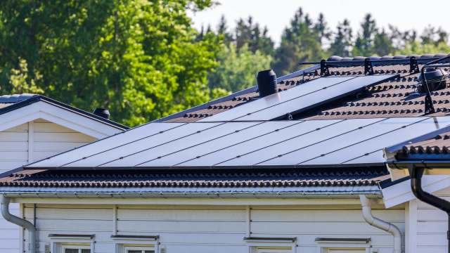 A rooftop with solar panels.