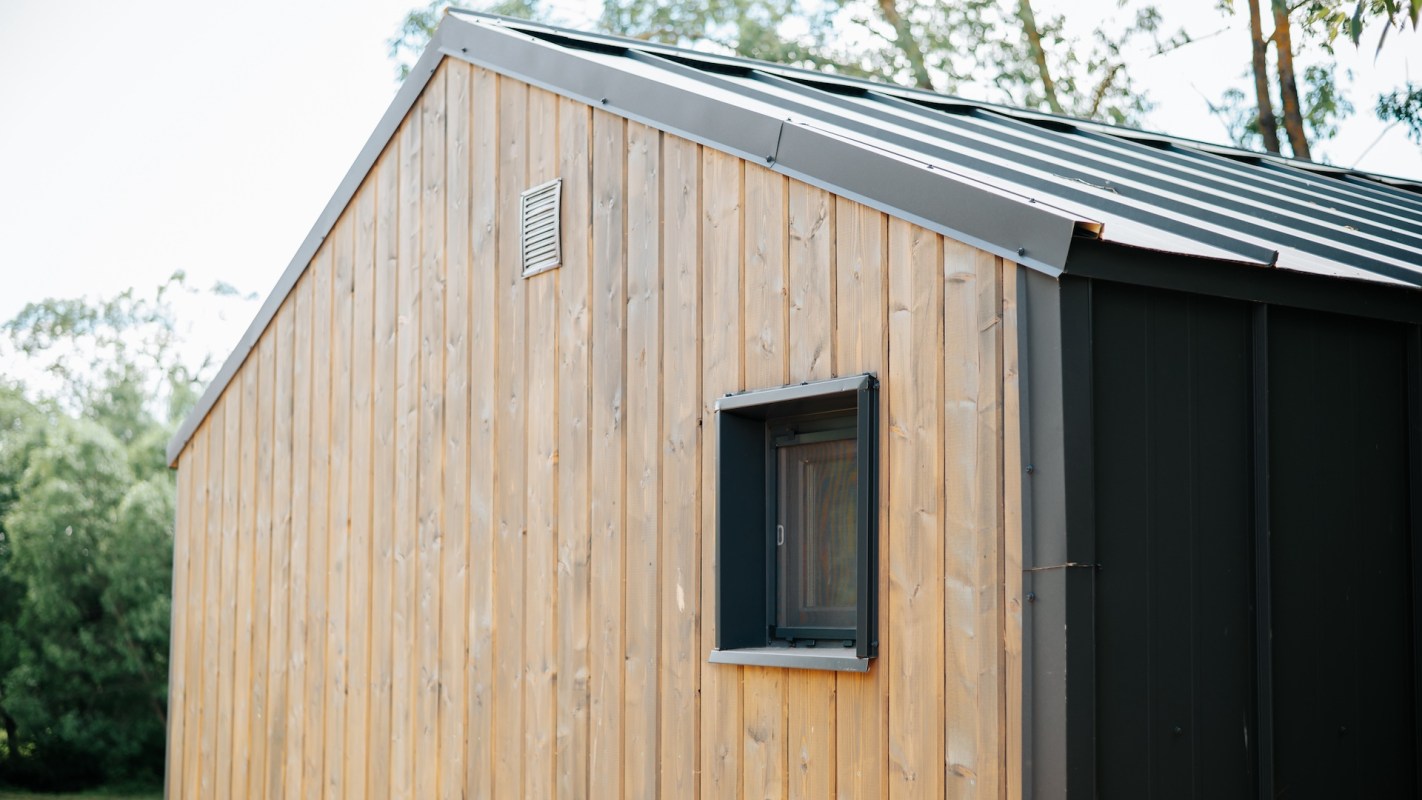 A wood-paneled building.
