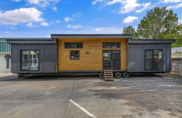 This 50-foot tiny house puts two bedrooms, two bathrooms, and 700 square feet on one floor