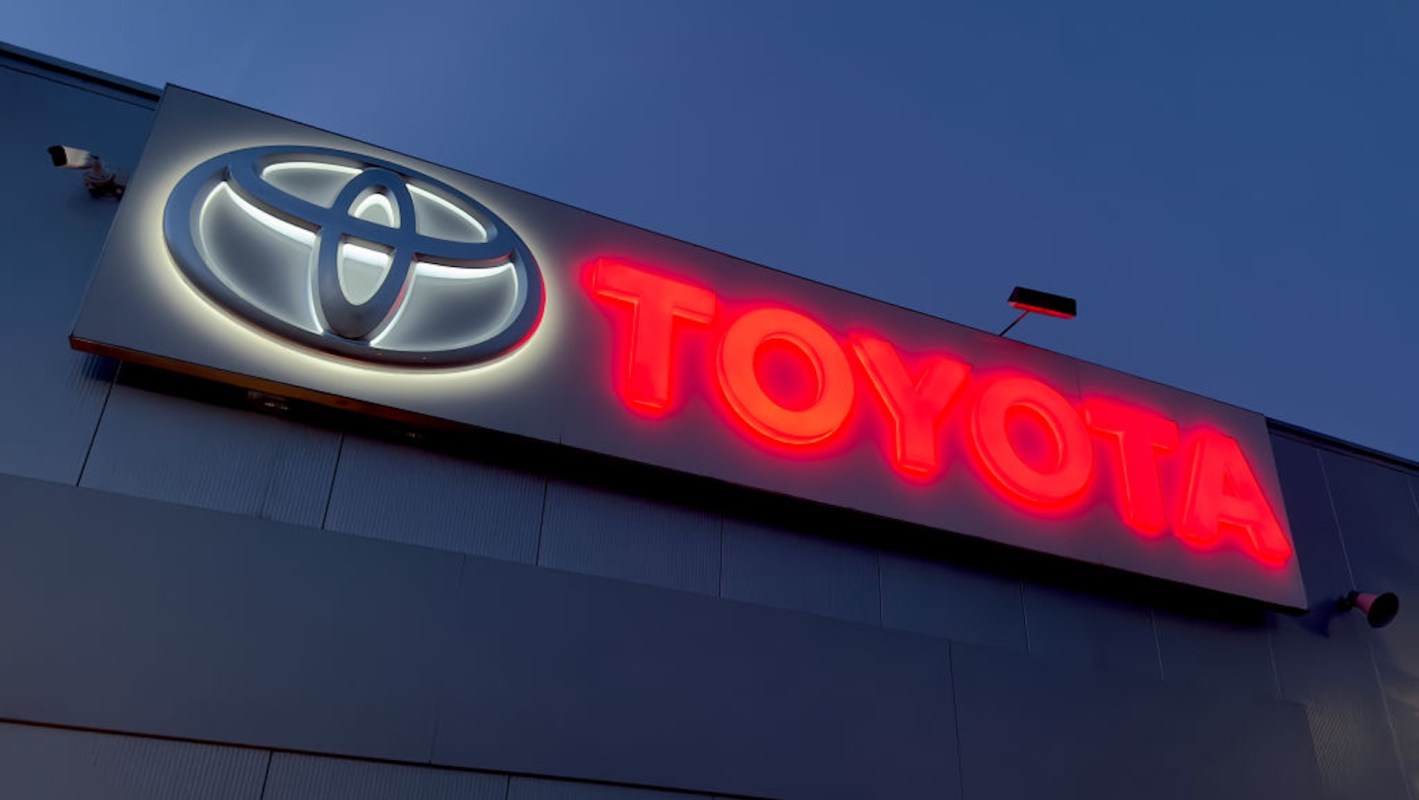 An illuminated Toyota sign.