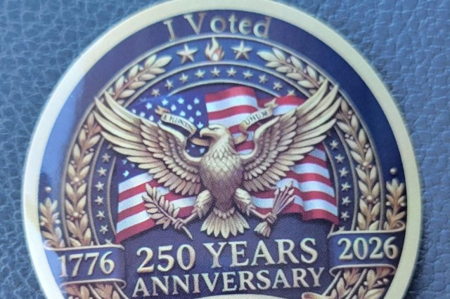 A sticker featuring an eagle, American flags, and text celebrating the 250th anniversary of voting from 1776 to 2026.