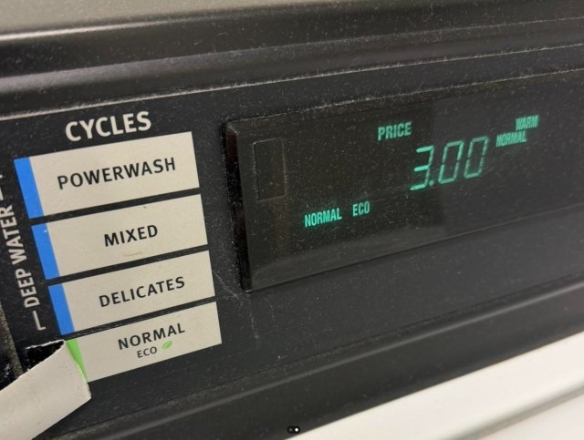 Tape rolled back from a washing machine's eco cycle.