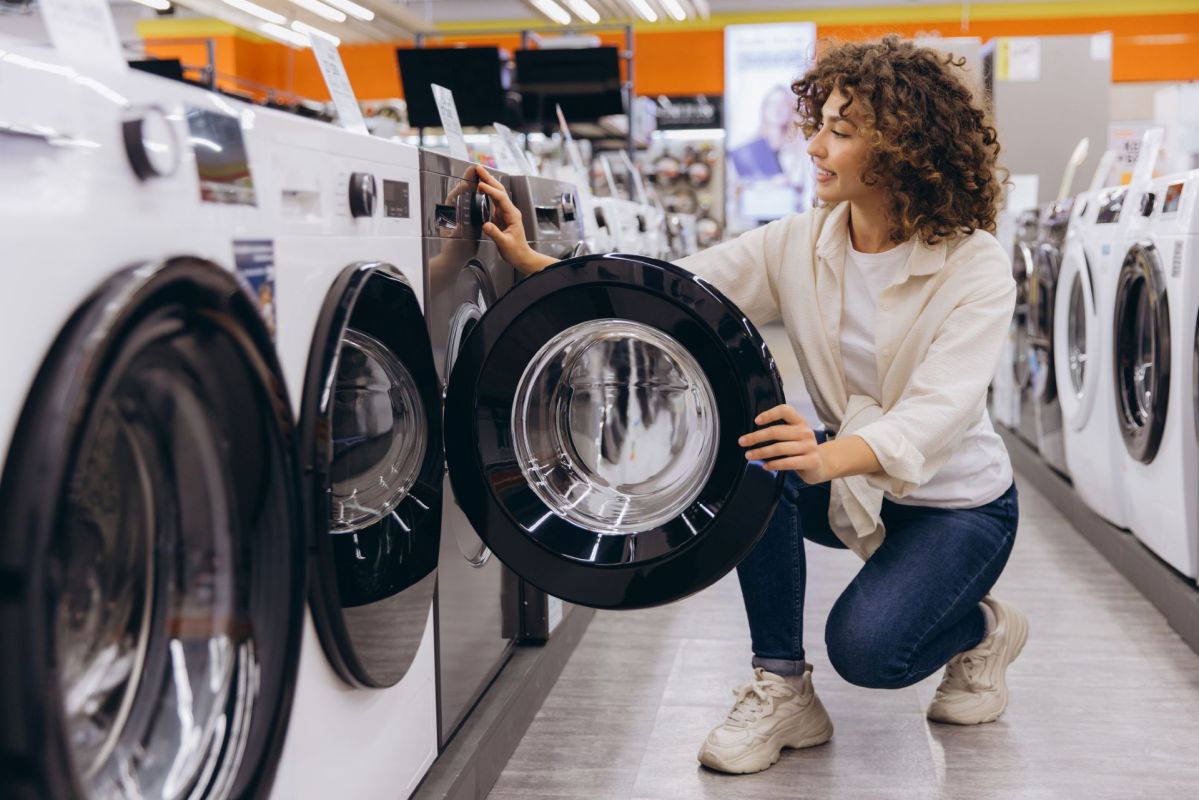 A woman shopping for a washer.