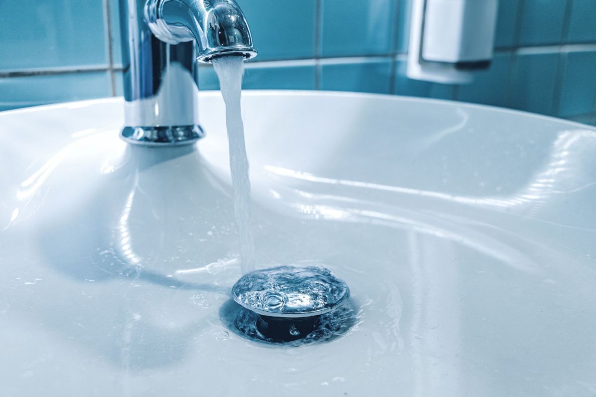 Water running from a faucet.
