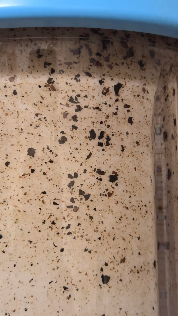 Brown liquid in a filter.