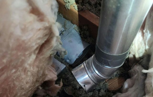 New homeowner goes to fix roof vent, then finds bathroom fan was never connected at all